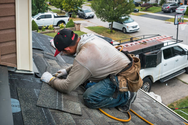 Professional Gutter Repair And Installation technician working in Whiting, IN